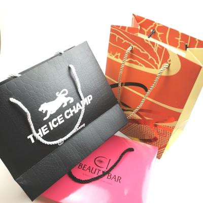 China Recyclable Wholesale Customized Logo Printing Black Paper Bags Hot Sales Texture High Quality PAPER BAGS for sale