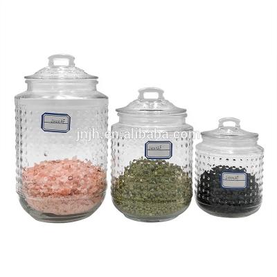 China Freshness Preservation Glass Kitchen Cereal Tea Coffee Storage Jar With Self-propelled Locking Lids for sale