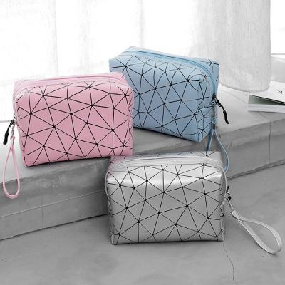 China Anti-Theft Customizable LOGO diamond PU leather Lady cosmetic bag travel bag for sale