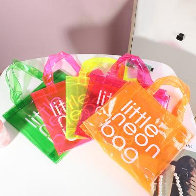 China Fashion Transparent Logo PVC Toiletry Bag Candy Handbag Large Capacity Storage Multifunctional Waterproof Dust Bag For Handbags for sale