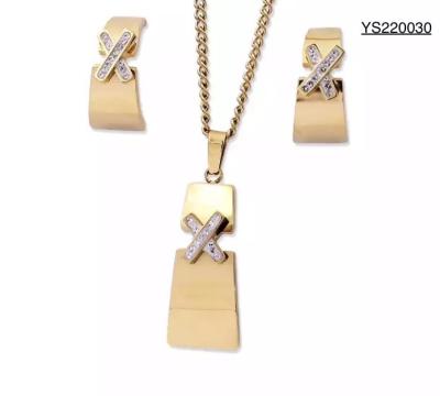 Chine Bijoux de créateur en acier inoxydable CE X strass incrusté pendentif collier boucles d'oreilles ensemble à vendre