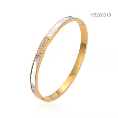 China Pulsera de concha blanca de tienda de lujo 12G 18k oro brazalete de acero inoxidable en venta