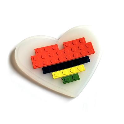 China 3D Design Embossed 3D Heart Shape Toy Brick Silicone Logo Patches Custom Apparel Soft Rubber Labels Sewing On Garment for sale