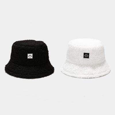 China Unisex Autumn And Winter Warm Decoration Teddy Velvet Smiling Face Bucket Hats Vintage Keep Warm Fisherman Beanie Women Headwear Hats for sale