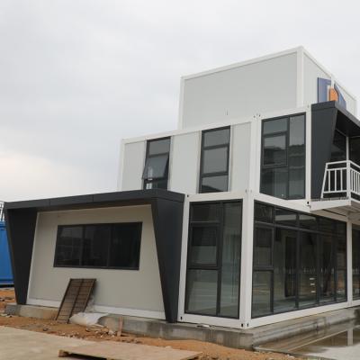 China Modern Prefab Houses Flat Pack Container Low Cost Building With High Quality For Construction for sale