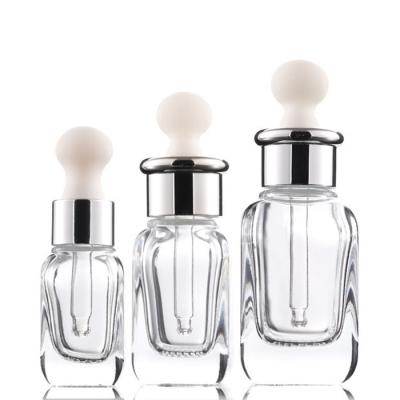 China Empty Cosmetic Rectangle Oil Stem Cell Serum Anti Aging Oil Personal Care Olive Dropper Glass Bottles for sale