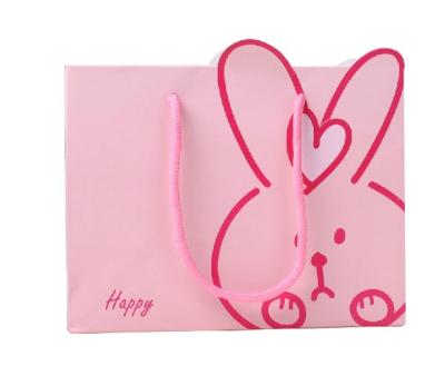 China Recycled Materials Wholesales Cute Pink Recycled Shopping Logo Custom Paper Bag with Twisted/Flat Ribbon Handles for sale