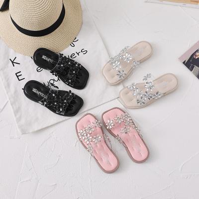 China New Flower Decoration Girls Princess Slippers Flats Kids Summer Beach Casual Slippers Unique Soft Elegant Flat Sandals Outdoor Girls for sale