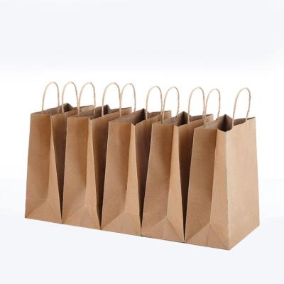 China Eco-Friendly Custom Made Restaurant Packaging Bag Porcelain Moisture Proof Paper Restaurant Food Carry Out Kraft Paper Bag for sale