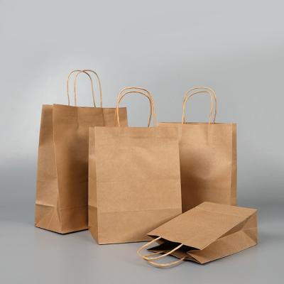 China Recyclable Wholesale Cheap Price Kraft Paper Shopping Gift Bag For Packaging for sale