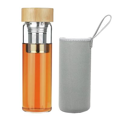 China Sustainable Portable Tea Drinking Double Wall Bamboo Lid Glass Water Bottle With Infuser for sale