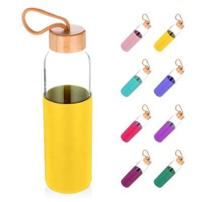 China Sustainable Hot Sale 550ml Amazon Glass Water Bottle Bamboo Lid Multiple Colors Available With Silicone Sleeve for sale