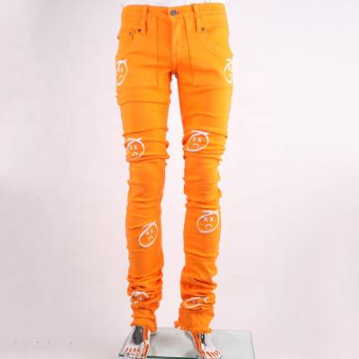 China Breathable Embroider Pants Custom Made Skinny Orange Denim Pile Trousers Fashion Jeans For Men for sale