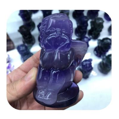 China China Hand Carved Cupid Natural Blue Angel Fluorite Crystal Carving Folk Crafts for sale