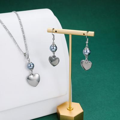 China Luxury Love Heart Jewelry Stainless Steel Necklace Earrings Hard Hot Selling Pendant Set For Women for sale