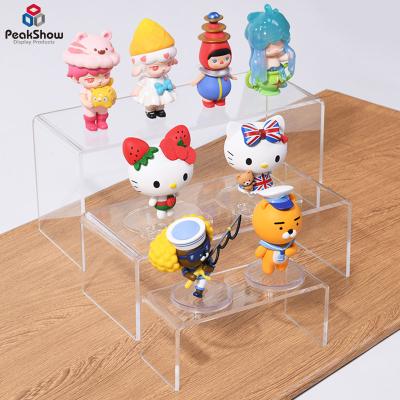 China Yageli China Manufacturer Customizable Wholesale 3 Tier Acrylic Confectionery Chocolate Snacks Shelf Display Rack Counter For Retail Store for sale