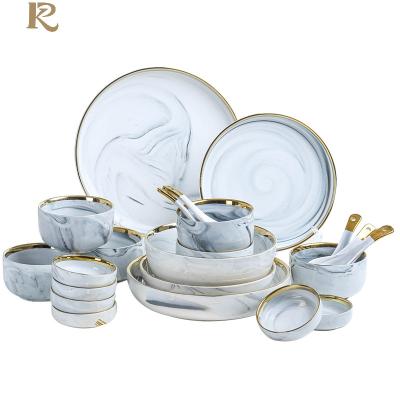 China Hot Selling Nordic Style Golden Edge Dishes And Plates Porcelain Dinnerware Sets Luxury Round Dinner Set Dinnerware for sale