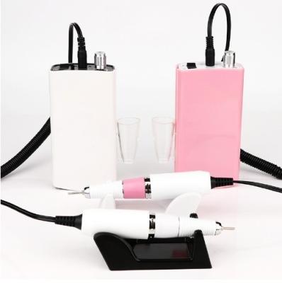 China Plastic Portable Electric Pink Cordless Rechargeable Nail Drill Machine 30000rpm Nail Drill Machine 801 for sale