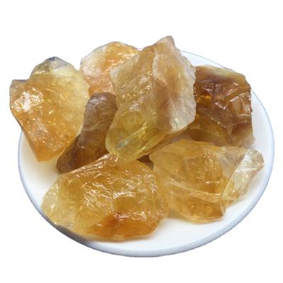 China Folk Art Wholesale Natural Yellow Crystal Healing Quartz Crystal Gravel Topaz Rough Stone for Decoration for sale