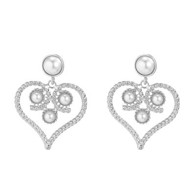 China Other stylish and retro baroque pearl earrings with hollow heart circle earrings and alloy earrings for sale