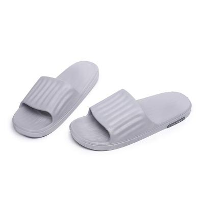 China Fashion Trend Amazon Customization Hot Selling Logo Slides Beige Thin Flat Bottom Slides Logo Flip Flops Custom Made For Men's Shower Slippers Shoe for sale