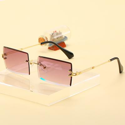 China Fashion Sunglasses Shape Eyewear 2021 Retro Vintage Men Women Tinted Small Rectangle Rimless Sunglasses for sale