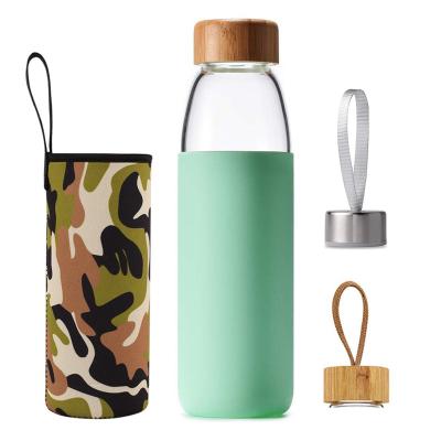 China Wholesale Customized Viable Borosilicate Glass Clear Water Bottle With Silicone Pad Bamboo Lid Glass Water Bottle for sale