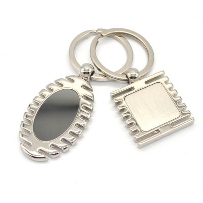 China Wholesale Custom Zinc Alloy Europe Stainless Steel Metal Mute Key Chain Mirror Keychain for sale