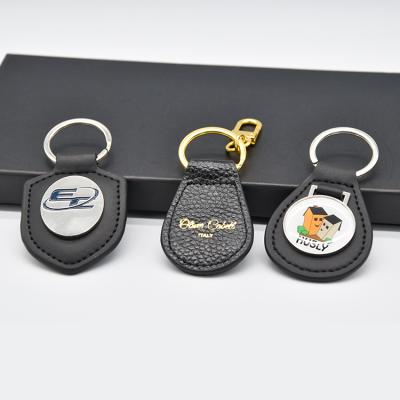 China Custom Logo Personalized Luxury Leather Key Chain Environmental Friendly PU Leather Blank Keychain for sale