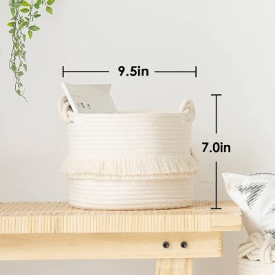 China Amazon Viable High Sales Cute Tassel Nursery Decor Cotton Rope Laundry Storage Basket with Knot Handles for sale