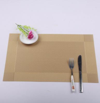 China Sustainable Wholesale Luxury Waterproof Champagne PVC Woven Place Mat For Dining Table for sale