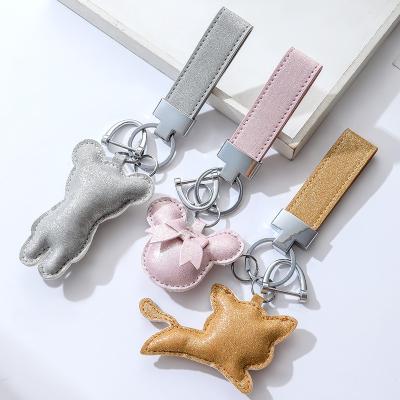 China Super Fiber Leather Simple Creative Design Jewelry Doll Fashion Key Chain Bracelet For Men And Women Hand Rope Metal Car Gifts Customized Key Chain for sale