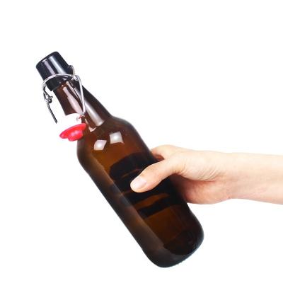 China Wholesale 1 Liter Amber Glass Beer Beverage Airtight Beverage Bottle With Swing Top Caps for sale