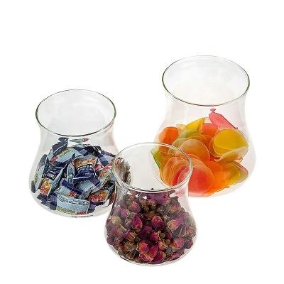 China Custom Sustainable Food Storage High Borosilicate Decorate Fancy Storage Glass Jars With Bamboo Lid for sale