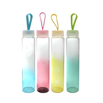 China Custom Stocked 300ml Colorful Fashion Cute Cute Glass Water Bottle With Plastic Screw Top for sale