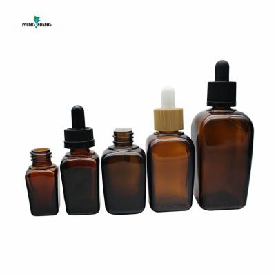 China Personal Care 10ml 20ml 30ml Amber Glass Dropper Bottles garrafa vidro Essential Oil Bottle Customize 30ml 50ml Frosted Cosmetic Bottle for sale