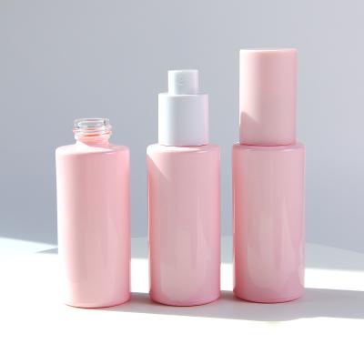 China Basic Cosmetic Liquid Serum Personal Care Glass Bottle 50ml Lotion Glass Bottle With Pink Cap for sale