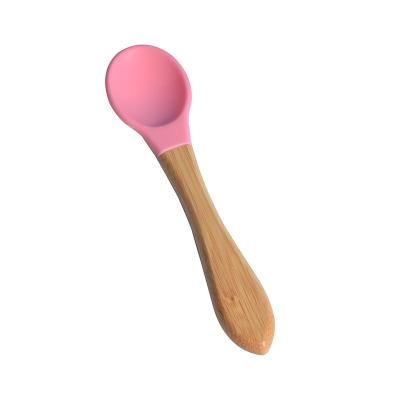 China BPA Free 100% Safe Wholesale Weaning First Stage BPA Free Toddler Feeding Soft Spoon Silicone Infant Spoon Tips Baby Spoons With Wooden Handle for sale