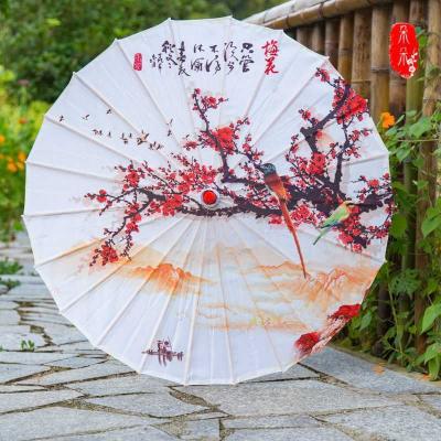 China Modern Waterproof Decorative Umbrella For Women Windproof Decoration Beach Rain Umbrella Sun Wax Paper Goods Cheap Shade for sale