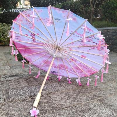 China 82CM Flower Antique Hanfu Tassel Umbrella Dance Performance Adult Photography Props Antique Umbrella Craft Oil Paper Umbrella for sale