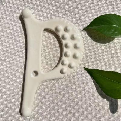 China Face Guasha Ceramic Massager Guasha Tools for Scraping Body and Face Beauty Tools for sale