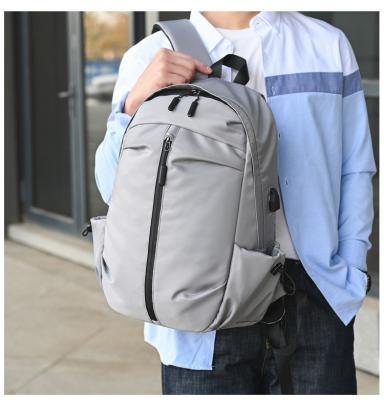 China Back Fashion Light Weight Men Business Backpack Laptop Bag Casual Outdoor Travel Bags With USB Filling for sale