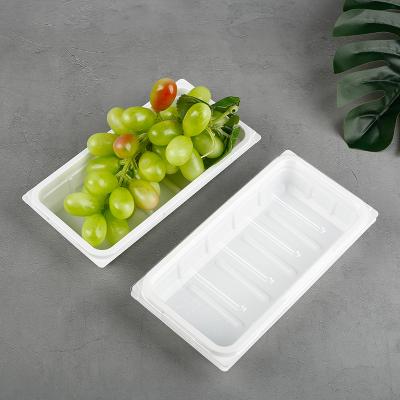 China Plastic Biodegradable Food Packaging Tray For Fresh Fruit Meat PET Disposable Blister Frozen for sale