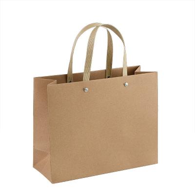 China Recycled Custom Paper Shopping Bag Gift Packaging Materials Paper Bag With Handle Brown Packaging Craft Bags With Your Own Logo for sale