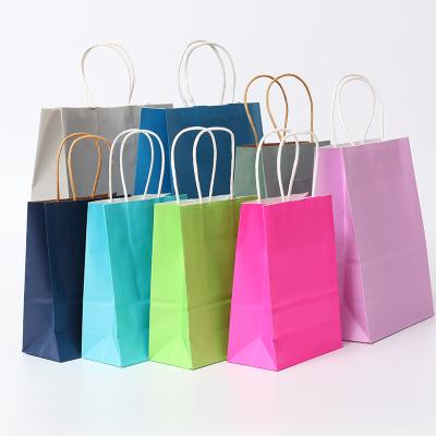 China Recycled Materials Spot Wholesale Recycled Custom Logo Brown Paper Package Food Wrap Paper Clothing Shoe Gift Shopping Bags With Handles for sale