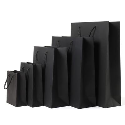 China Recycled Materials Black Paper Bags With Handle Recyclable Shopping Paper Bag With Your Own Logo Gift Shoe Apparel Kraft Paper Bag Custom for sale