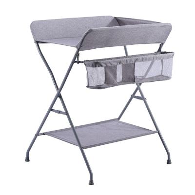 China Portable Collapsible Foldable Baby Bag Steel Frame Baby Changing Table With 4Pcs Wheels for sale