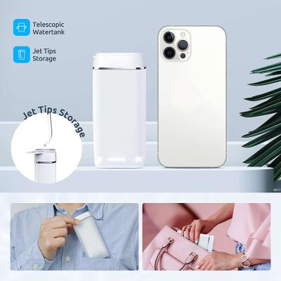 China Portable Hotel Tablets Travel Professional Wireless Water Flosser Dental Oral Water Pik Teeth Cleaning for sale