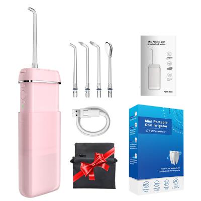 China Hotel Best Quality Electric 2 in 1 Oral Care Dental Irrigator Manual 3 Operation Model Water Flosser for Teeth Cleaning for sale