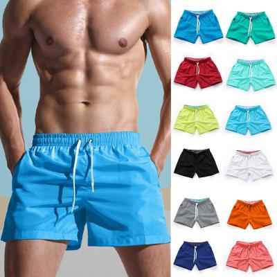 China Custom Made 100% Polyester Beach Shorts Waterproof Solid Mens Swimwear Shorts for sale